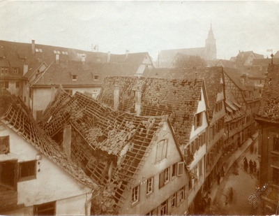 In World War I, houses in the Archgasse were destroyed after the 12th air strike. October 1916, Photo by Paul Sinnr - long  duplicate photo