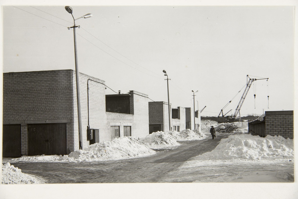 Cooperative magazines of Tartu, Kuuse Street. Construction of the foundation of the high building in the rear plan. Look out of town.