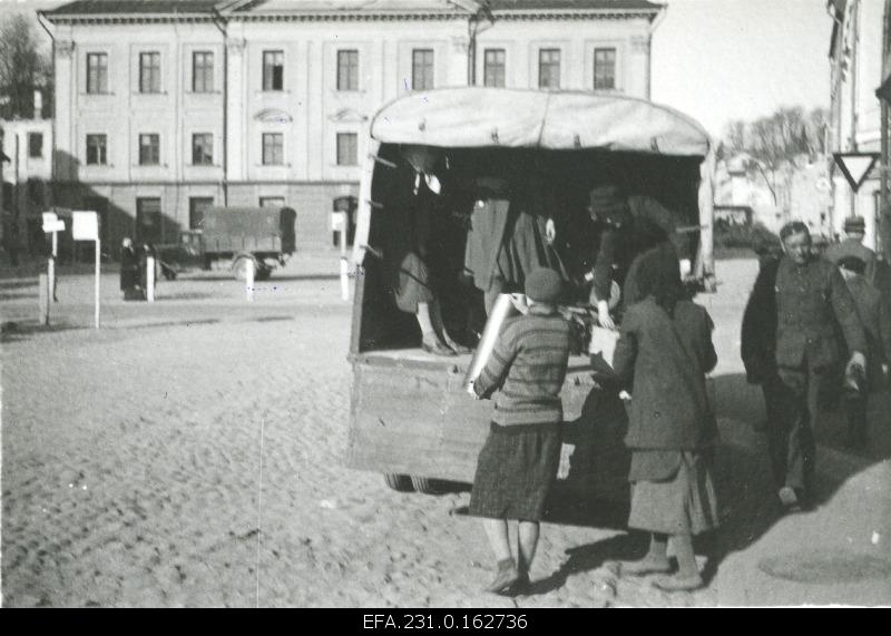 German occupation in Estonia. Collecting colored metal to the car for transportation to Tartu Station.