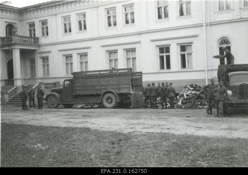 German occupation in Estonia. German military personnel bringing heating to the Estonian National Museum.