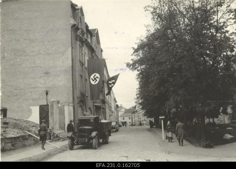 German occupation in Estonia. Haachrist and SS flags on the University Street.