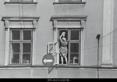 Window dresser.  similar photo