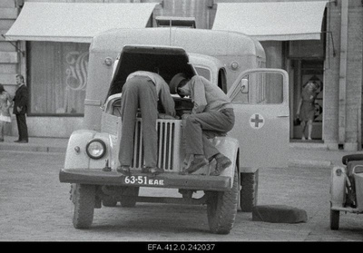 Militias Repair of operation cars on the Raekoja square.  similar photo