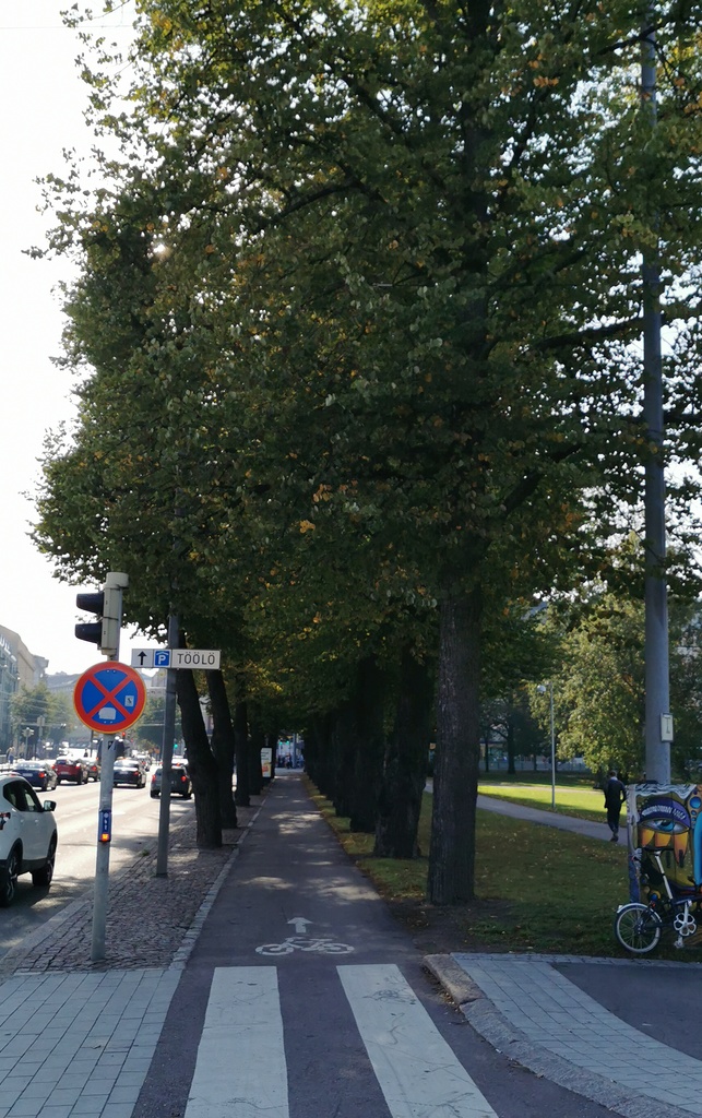 Helsinginkatu. Vasemmalla Helsinginkatu 58, taustalla Mannerheimintie. rephoto
