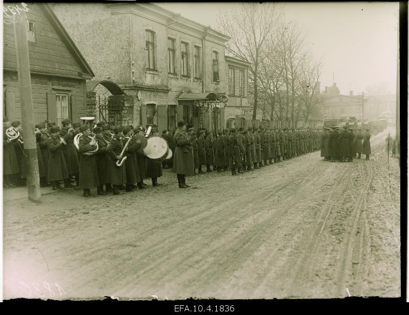 Tanks and embroidery cars on parade.