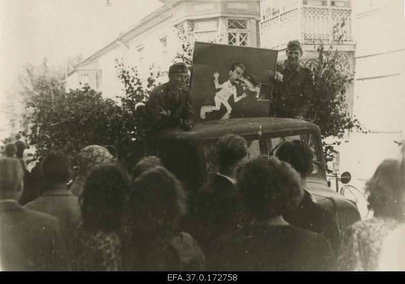The German military car with a caricature depicting Stalin on the street of the city of Pärnu.