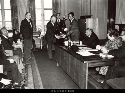 At the solemn meeting of the 30th anniversary of the Estonian Geography Society in the Estonian Academy of Sciences (Kohtu 6) the Society is congratulated by the research secretary of the Institute of Geology of the Academy of Sciences Herbert Viiding (from the left), Director Dimitri Kaljo and researcher Avo Miidel; behind the table President of the Estonian Geography Society Jaan-Mati Punning, Latvia Geography President of the Society V. Purin, Research Secretary of the Society Laine Merikalju and Vice-President Anto Raukas.  similar photo