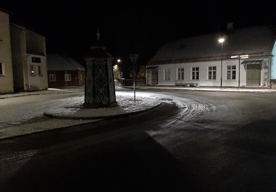 An old town yard with metal coating walls in Kingissepa. rephoto