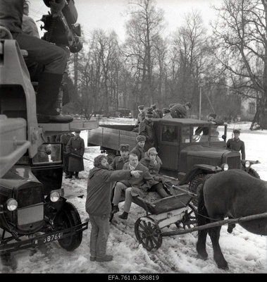 Filming the "Earl" film. Jüri Sillart, director, is instructing the deporters on trucks and vans.  similar photo