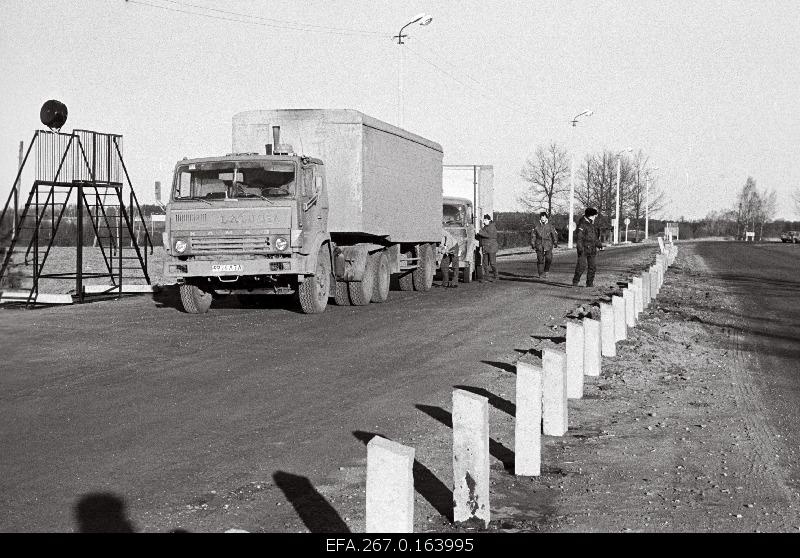 Latvian trucks are waiting to cross the border at the Valga customs office.