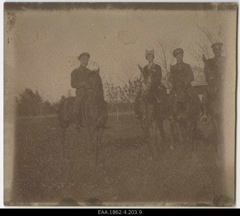 Four soldiers on horses