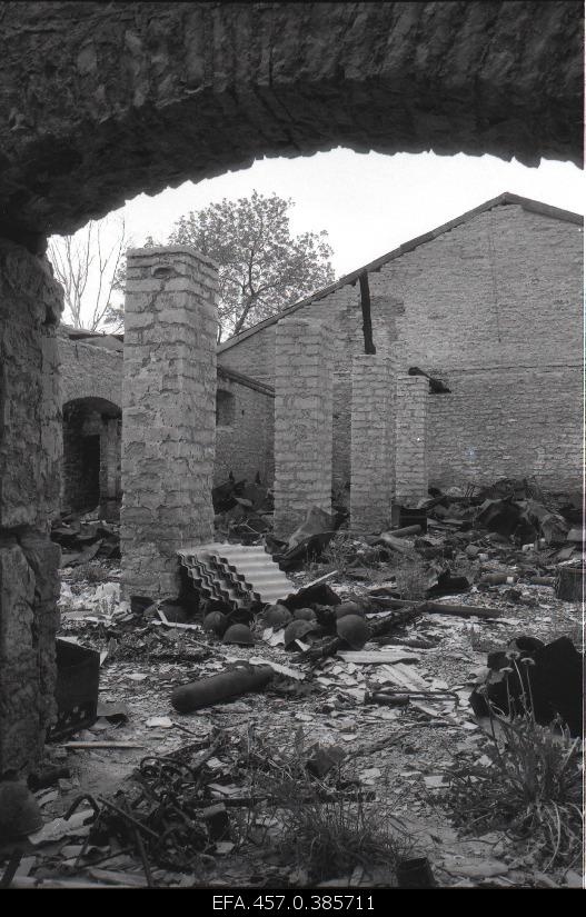 Military chivals in the ruins of the military building.