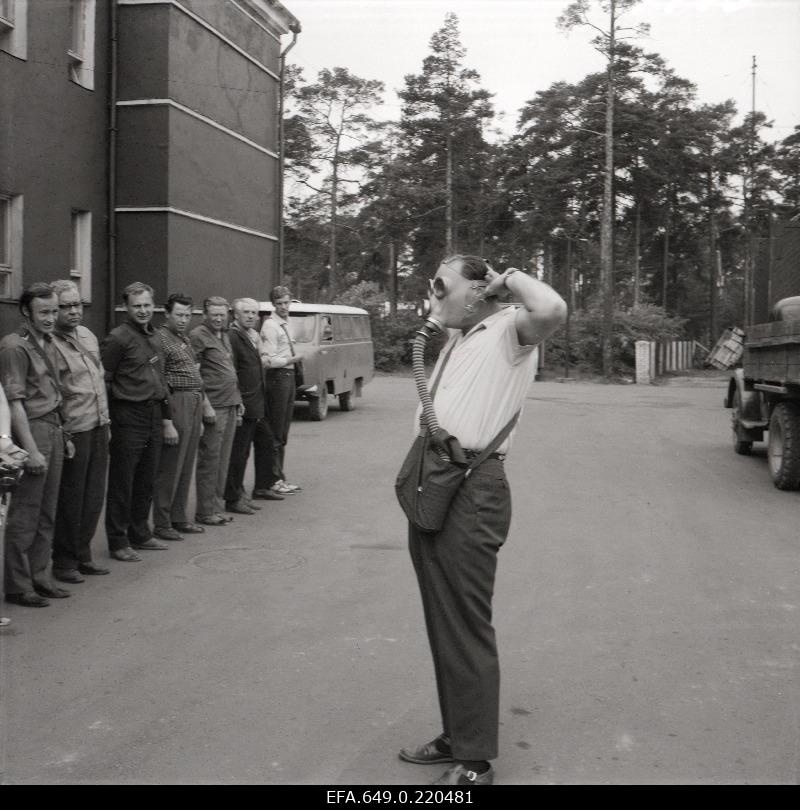 Exercises in the use of gas masks.