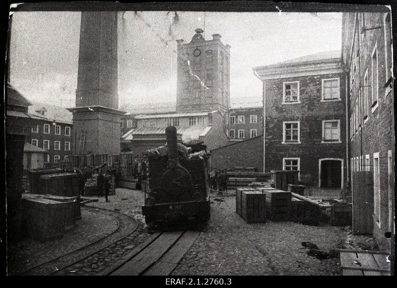 Sindi factory harbour during the German occupation period of 1918, where the plant equipment was partly packed in boxes for withdrawal.