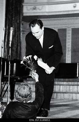 The Soviet Union's folk artist Georg Ots received flowers and gifts after the performance in the concert hall "Estonia".  similar photo