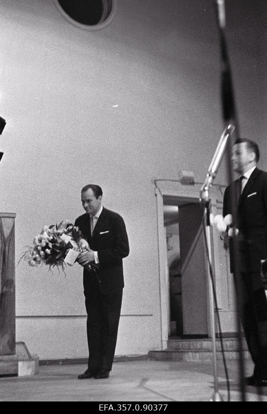 The Soviet Union's folk artist Georg Ots bows to the audience after the performance in the concert hall "Estonia".