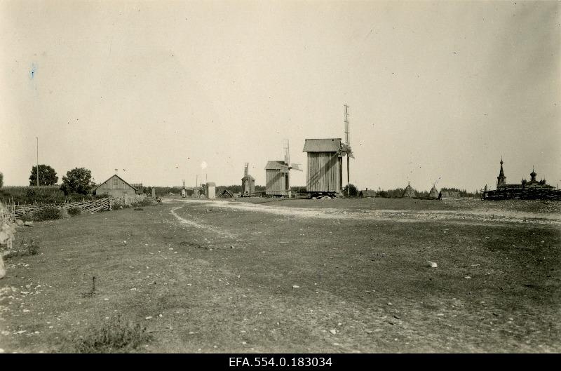 View of the Hullo village windmills, on the right of the Russian Orthodox Church.