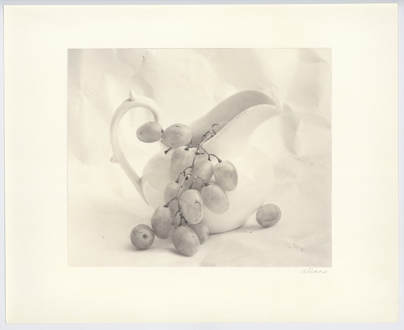 Can with grapes.