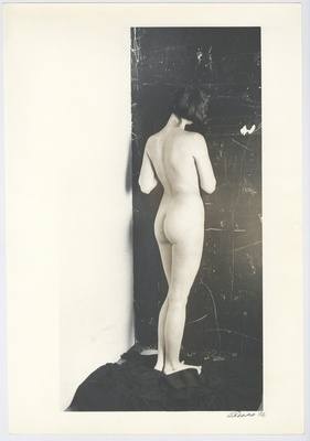 A woman's act with her back. 1986  duplicate photo