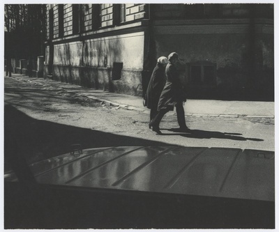 View through the car window: women walk on the street.  duplicate photo