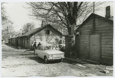 Broken low wooden buildings Ujula Street 7.  duplicate photo