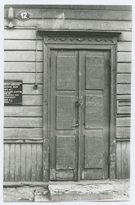 Wooden door on the 12th house of Paldiski Highway.  duplicate photo