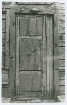 Wooden door on the 12th house of Paldiski Highway.  duplicate photo