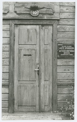 Wooden door on the 10th house of Paldiski highway.  duplicate photo