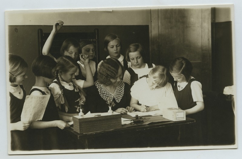 Teacher and students in the class.