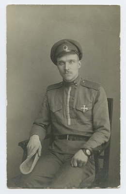A portrait of a young man in military form, ateljeefoto.  duplicate photo