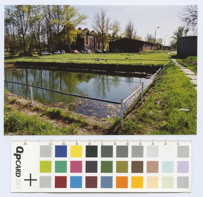 View of the tigue. Away the armchair buildings and passenger cars. Colorful.