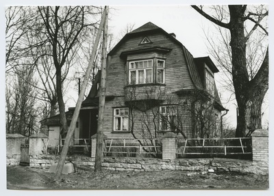 Tallinn. Old wooden house with 3a mansard corner racing  duplicate photo