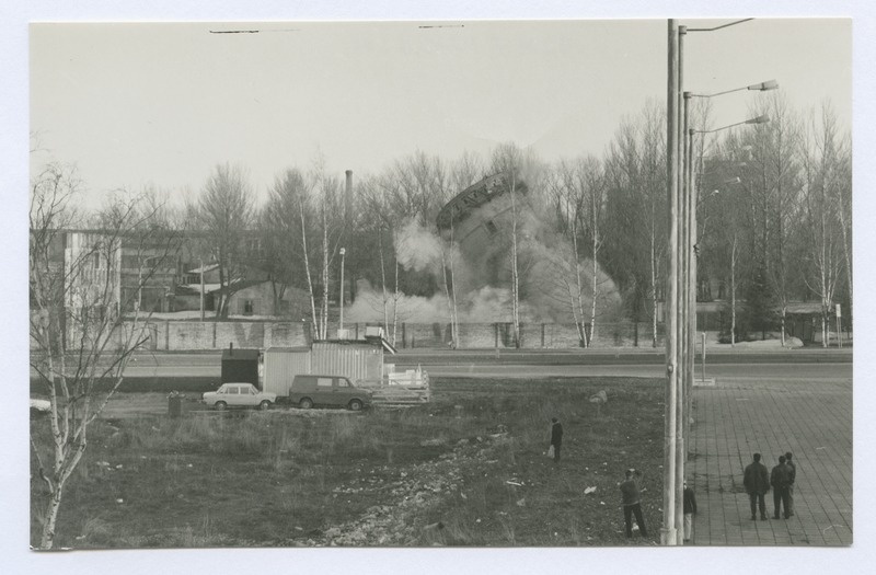 Tallinn. View of the blowing of the water tower. The water tower falls together in the dust cloud