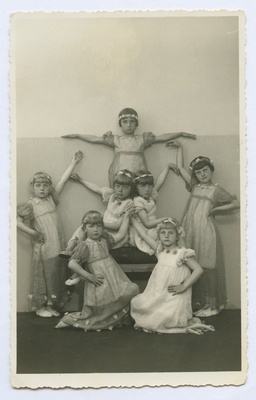 Children's dance group in performance costumes  duplicate photo