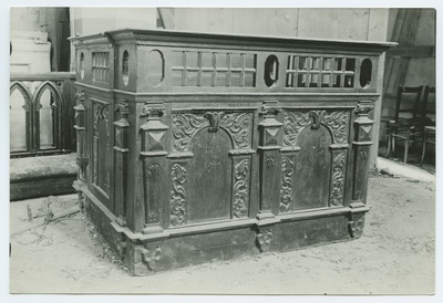 Closed church bench, decorated with wooden beds, in the Niguliste Church.  duplicate photo