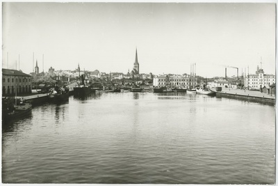 Tallinn harbour, view from the sea, behind the city's siluette.  duplicate photo