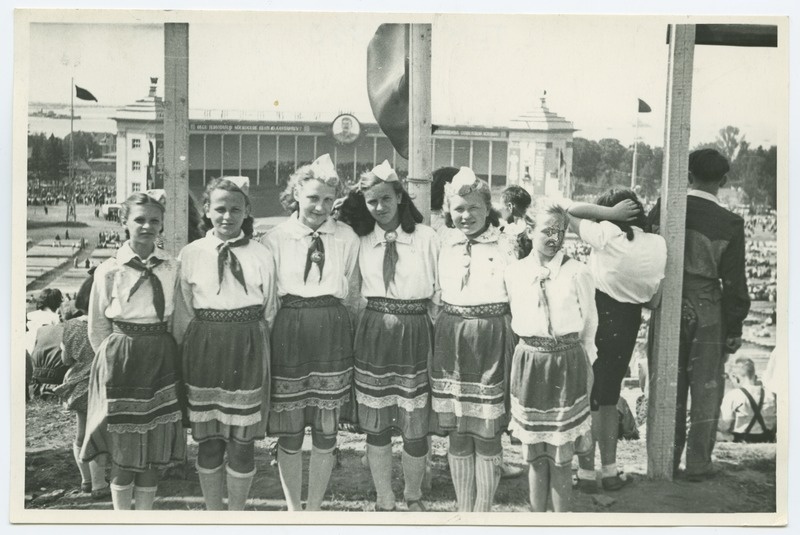 1950 song festival in Tallinn, a group of choir songs in Muhu folk dresses on the song field.