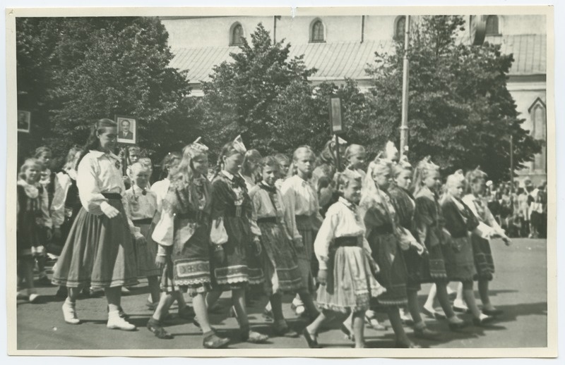 The 1950s song festival in Tallinn, Muhu's children's choir in folk clothes, a train walk in the Winning Square.