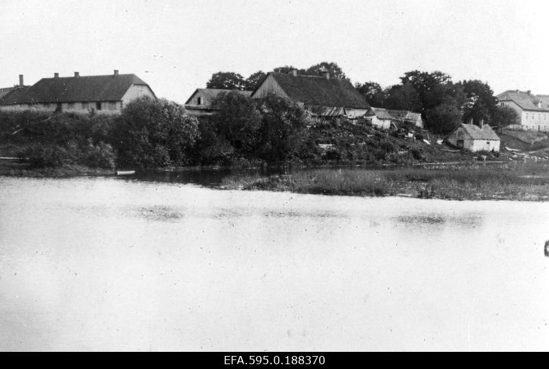 View of some buildings on the shore of Lake Veski.
