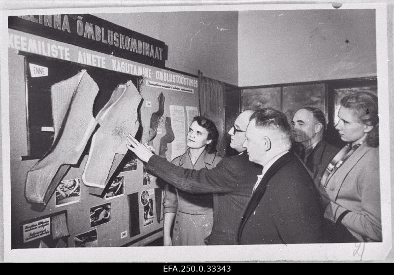 At the meeting of the employees of the Lithuanian Soviet Union, the Latvian Soviet Union and the Estonian Soviet sewing industry, Chief Engineer of the Tallinn Sewing Combination I. Beltšikov (second left) introduces a new gluing method to the guests.