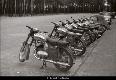 Parked motorcycles on Pirital.  similar photo