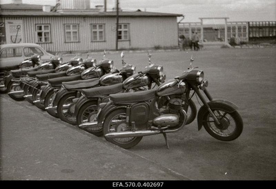Parked motorcycles on Pirital.  similar photo