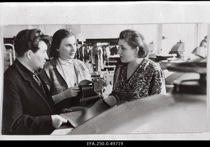 Prokofi Karasev, Chairman of the Cooperative Group of the Party and State Audit Office, and member of the group, senior economist Irene Talmet, Head of the Cutting Team Lidia Artemenko, assisted in controlling the quality of the skin.