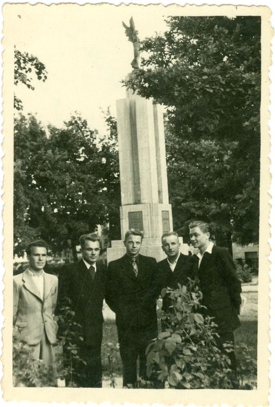 Pranas Tercijonas (second from the left) with friends in the courtyard of Kaunas War Museum before exiting