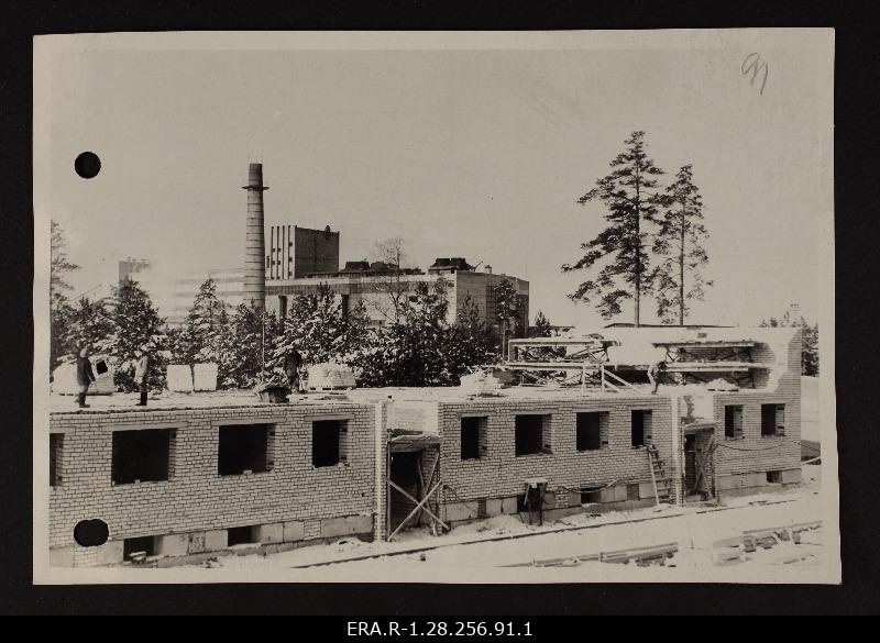 View of the construction of the apartment building in Oru settlement
