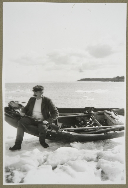 Fisherman with stones in the spring morning in Raahe Archipelago