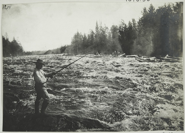 Fisherman in Kuusamonkoski, on the opposite shore of Tukkilas