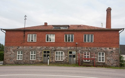 Oiu Milk Industry Building in 1960s. rephoto