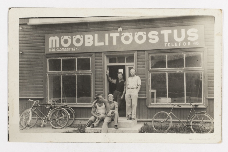 Men in front of the furniture store