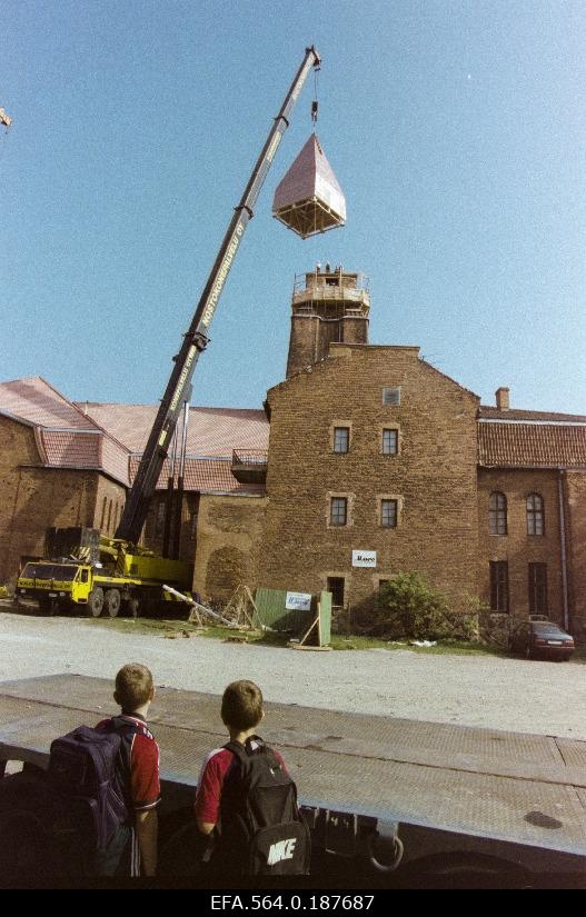Installation of the renovated tower stone in the church of Paulus.
